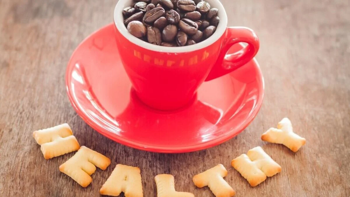 Coffee Health Benefits | close-up-coffee-beans-cup-with-snacks-table