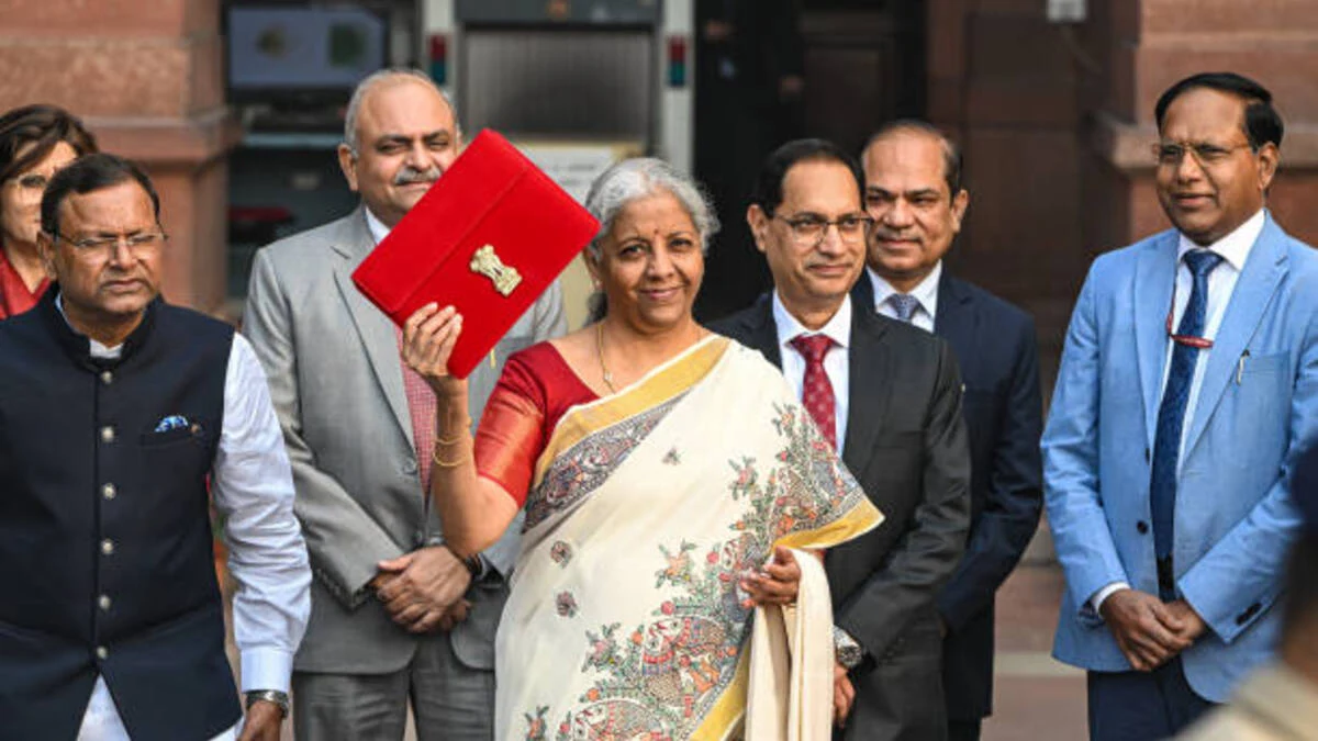 Budget 2025 Tax Relief | Nirmala Sitharaman, India finance minister, center, and other members of finance ministry leave the ministry to present the budget at the parliament in New Delhi, India, on Saturday, Feb. 1, 2025