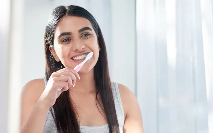 woman-toothpaste-toothbrush-cleaning-teeth-dental-health-morning-routine-bathroom-girl-face-mirror-washing-mouth-with-tooth-brush-